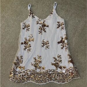 About a girl small beige tank top